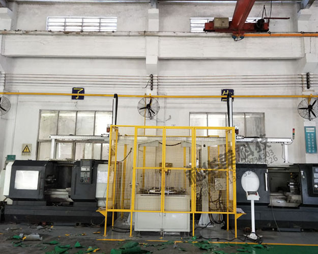 雙臂型數(shù)控機(jī)床機(jī)械手